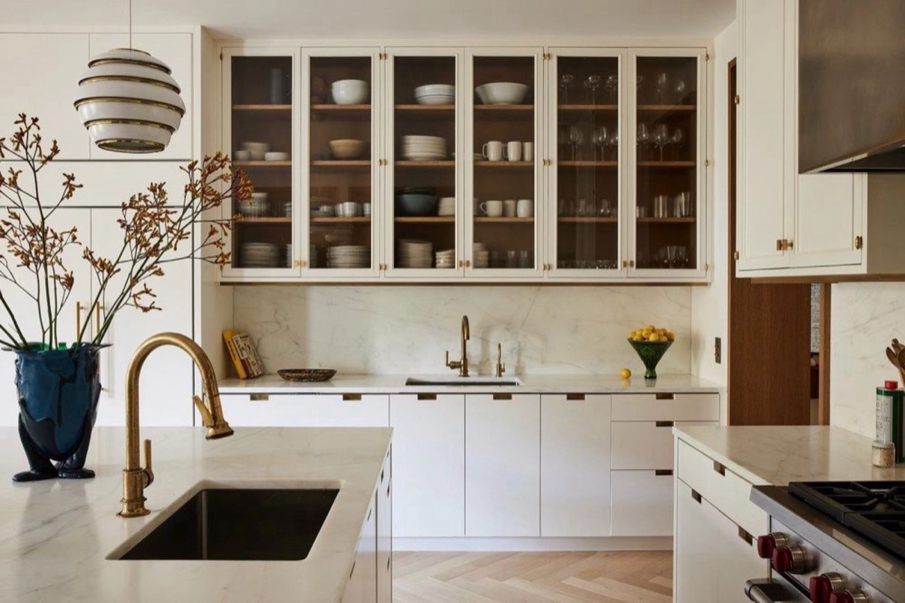 Bright white kitchen with open shelving