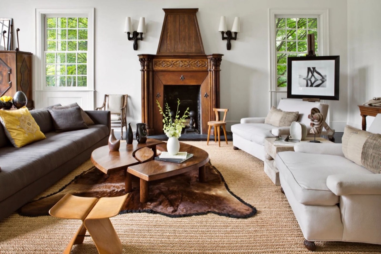 Living room with a fireplace and natural light